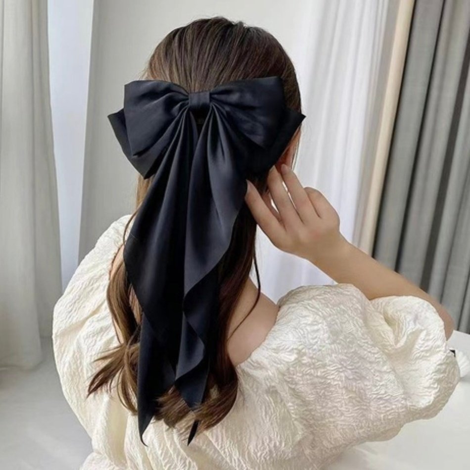 LONG FLOATING HAIR BOW